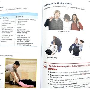 NSC First Aid, CPR and AED Student Workbook open to rescuing and moving victims first aid techniques.