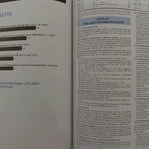 OSHA 29 CFR 1910 General Industry Regulations book open to pulp, paper, and paperboard mills sections.